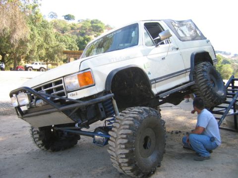 1985 Ford Bronco - Customized 1985 Ford Bronco on display, extreme off-road modifications and large tires.