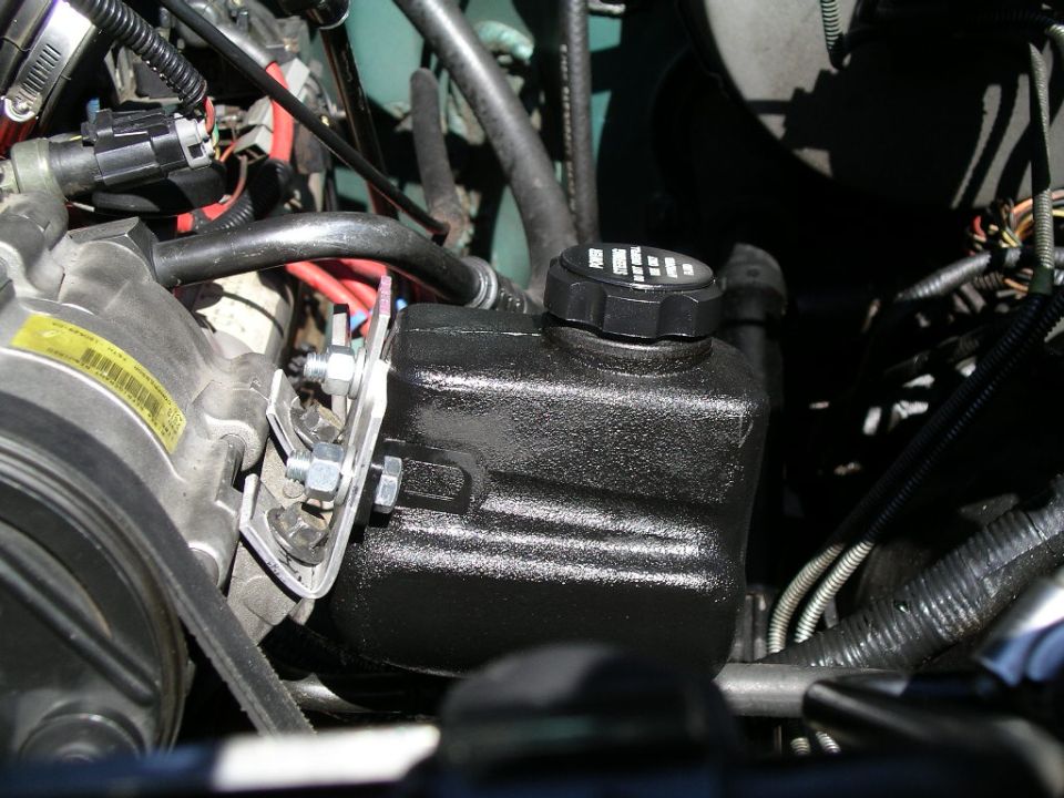 The resivoir is out of a Chevy econo box.  Lots of vehicles use a resivoir.  If I had it to do over again I would get one out of a Chevy-20 van or BMW.  Both have more capacity.