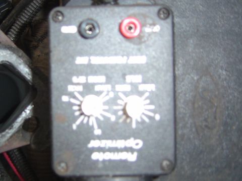 1993 Ford Bronco - This is a close-up view of a remote optimizer module with adjustable knobs and input/output terminals.