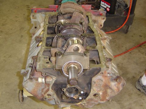 1993 Ford Bronco - The internal components of an engine block are exposed, showing the crankshaft and bearing supports.