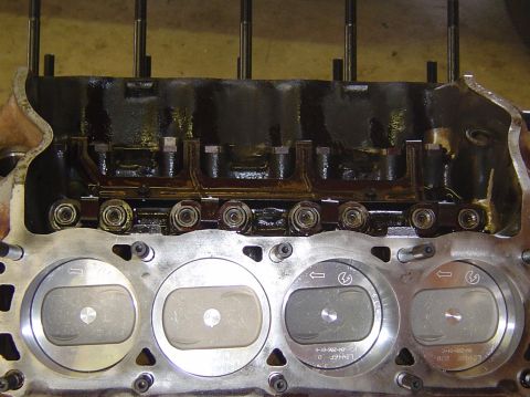 1993 Ford Bronco - Close-up view of an engine block's internal components, including pistons and valve train.