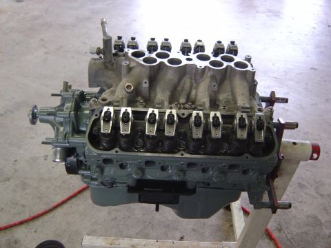 1993 Ford Bronco - Engine assembly on a stand, likely for rebuild or repair.