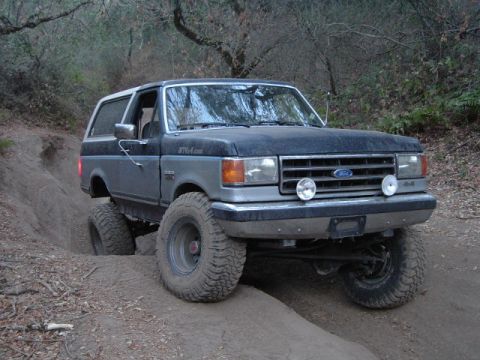 1989 Ford Bronco - This 1989 Ford Bronco is shown tackling a challenging off-road trail.