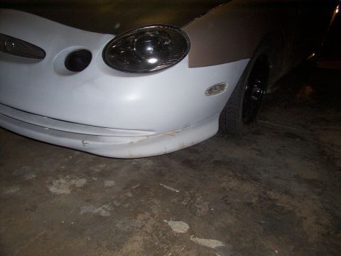 1998 Mercury Sable - The front of a car is shown, appearing to be in the process of being repaired or modified.