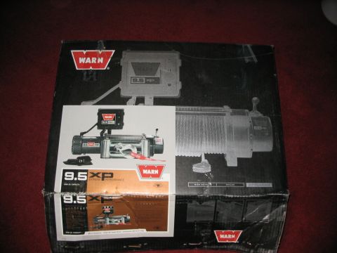 1986 Ford Bronco - Box for a Warn 9.5 XP winch, showing product images and specifications.