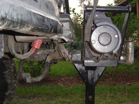 1993 Ford Bronco - A winch and trailer hitch receiver are attached to the rear of an unidentified vehicle.