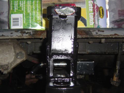 1993 Ford Bronco - Close-up of a trailer hitch receiver, with a "Trophy" sticker visible on top.