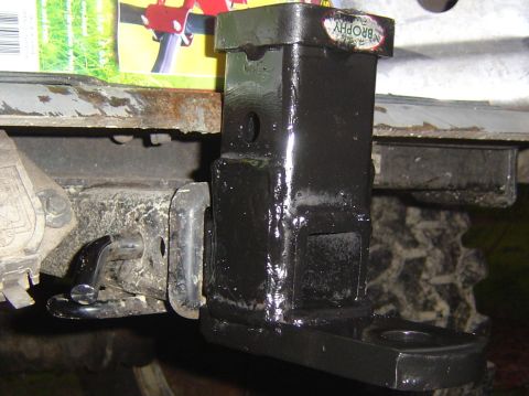 1993 Ford Bronco - Close-up of a trailer hitch receiver, a Brophy brand sticker on the top.