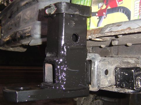 1993 Ford Bronco - Close-up of a trailer hitch receiver and attached hitch, with 'FULTON' branding visible.