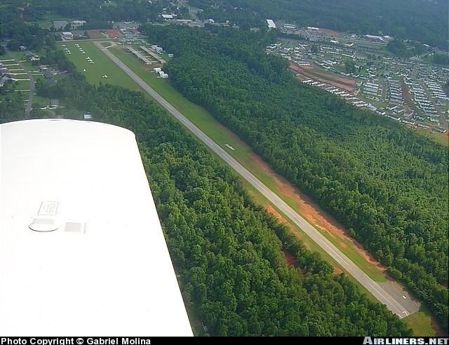 My hometown airport, Wilgrove in Mint Hill, NC. 2700 feet long, 36 usable feet wide, trees one end, power lines at the other...mason jars and 60 watt light bulbs for runway lites which turn off at 1am, and no rotating beacon. Night landings are a wee bit butt puckering...