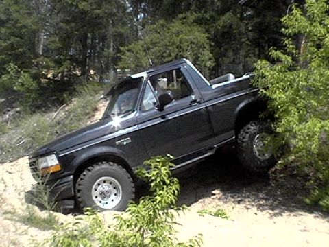 1995 Ford Bronco - This black Ford Bronco appears to be from the early to mid-1990s, not a 1995 model.