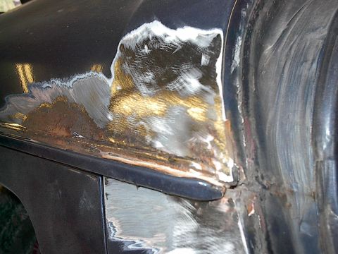1986 Ford Bronco - More typical rust damage being exposed by blasting and grinding.