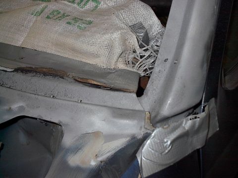 1986 Ford Bronco - These minor pock marks and pits are filled nicely by hot lead, then they're sealed with two stage urethane primer/sealer and spray painted.
