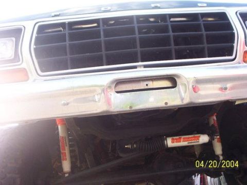 1978 Ford Bronco - Front view of a 1978 Ford Bronco, showing the grille, bumper, and suspension parts.