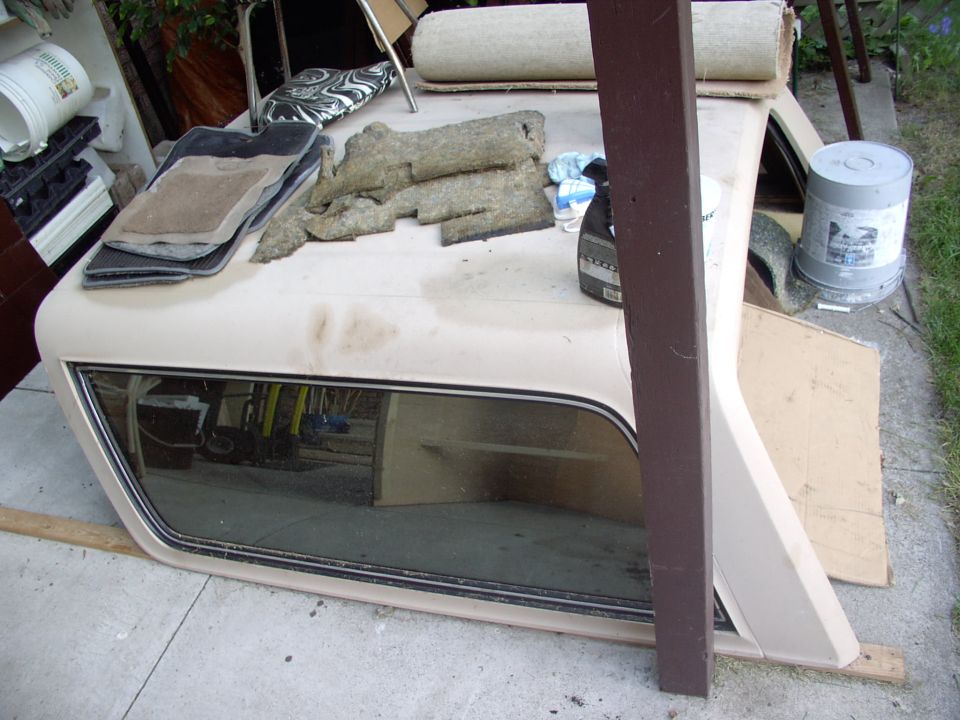 Here's a suitably flat surface. I just slapped two 1X3s down and lowered the top onto them for storage. The junk on top, to stop it from blowing away, is optional.