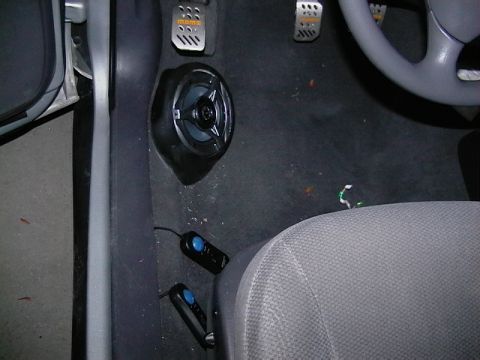 1999 Ford Taurus - Aftermarket speaker and pedals are visible in the driver's side footwell of this vehicle.