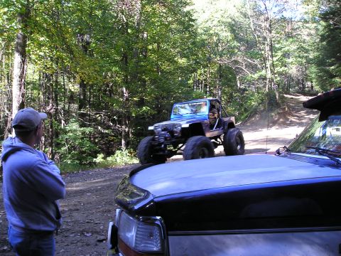 1996 Ford Bronco - Jeep passing by