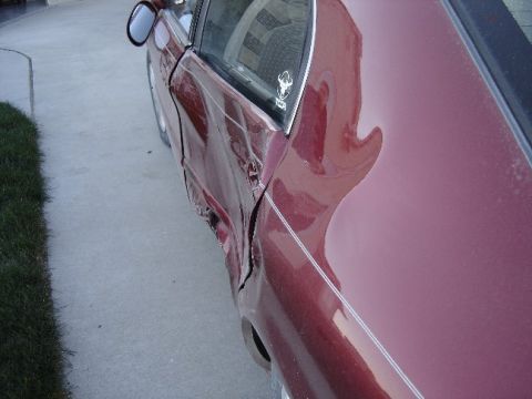 1998 Mercury Sable - Driver's side door and fender severely damaged on a 1998 Mercury Sable.