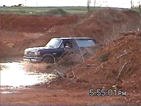 1988 Ford Bronco - This 1988 Ford Bronco navigates a muddy off-road course.