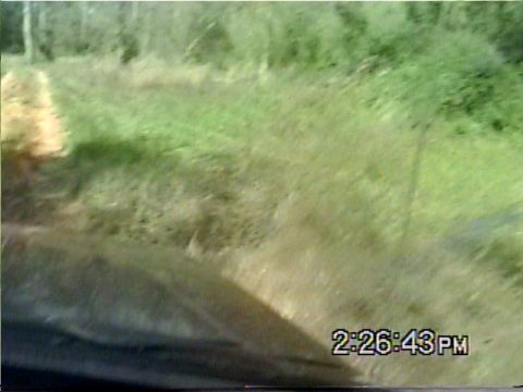 1988 Ford Bronco - Driving through a grassy area, the timestamp indicates 2:26:43 PM.