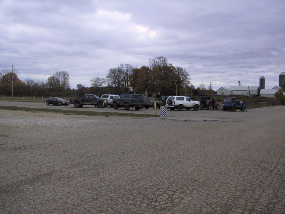 White 1993 Ford Bronco parked in a lot with other vehicles