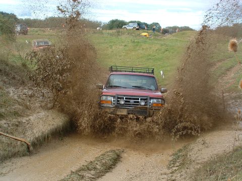 1996 Ford Bronco - Showing off for the Brits. Hit it about 15MPH. Hella splash