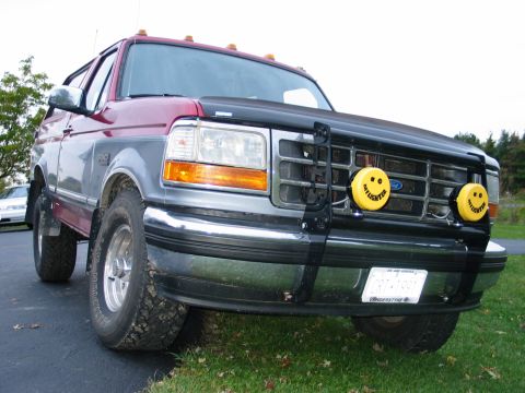 1995 Ford Bronco - Front view of a 1995 Ford Bronco, equipped with a brush guard and auxiliary lights.