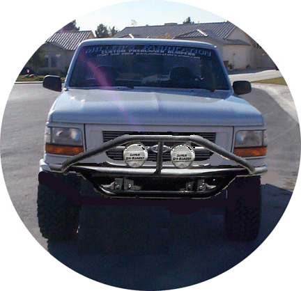 1992 Ford Bronco - Front view of a 1992 Ford Bronco with an aftermarket bumper installed.