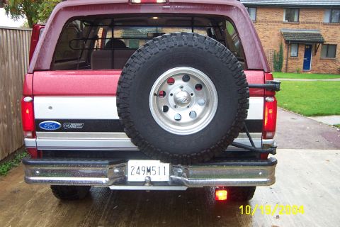 1996 Ford Bronco - Rear fog light that is easily removed when 4x4ing. Turn signals mounted to light cover and wired to front turn signals.