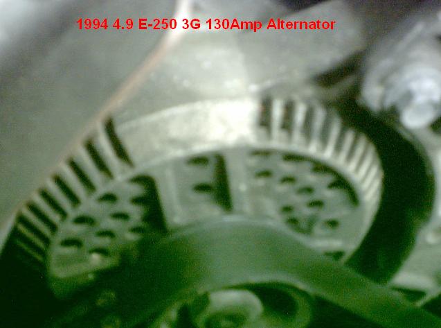 Engine bay close-up of a 3G 130-amp alternator labeled 1994 4.9 E-250