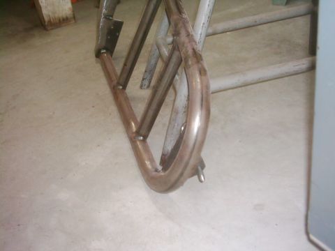 1978 Ford Bronco - Fabricated tube doors, possibly for a Bronco, sit on a concrete floor in a garage.
