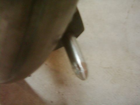1978 Ford Bronco - A close-up view of a chrome door handle, possibly from a vehicle part.