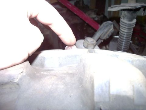 1978 Ford Bronco - A coin is placed on a part of the engine, possibly for scale or to mark a spot.