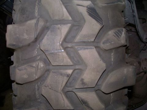 1978 Ford Bronco - A close-up view of a tire tread, likely from a heavy-duty vehicle.