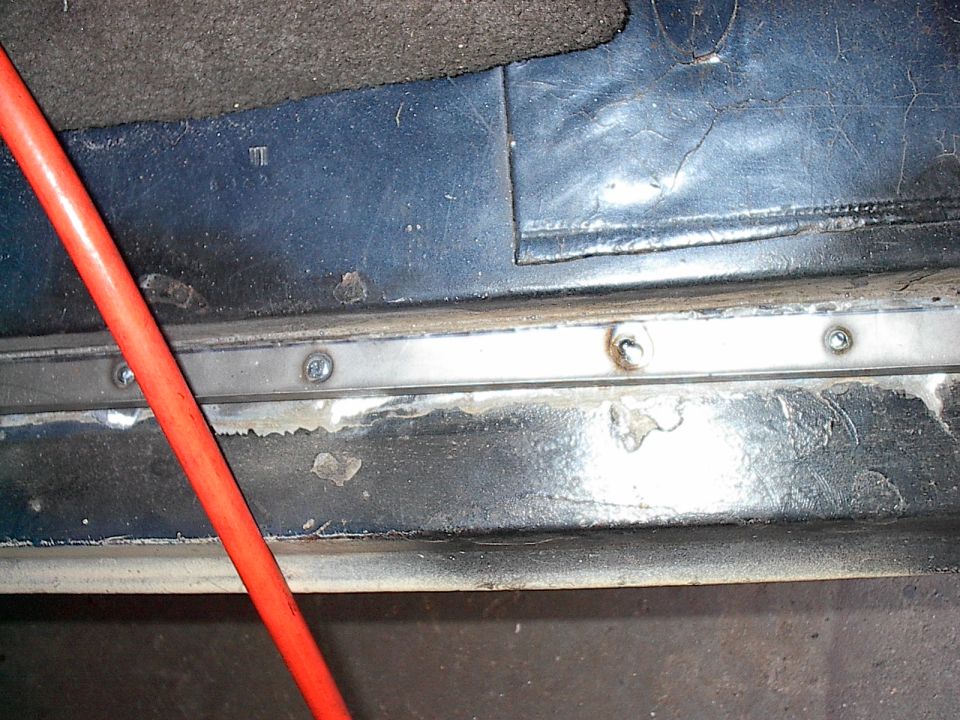 It wasn't tough bending up new angled edges. I just drilled holes for the welding shop to button weld on for me.  Now I'll just treat the rusty areas, seam seal all the seams and paint them black until the bodyshop shoot them during the final paint job