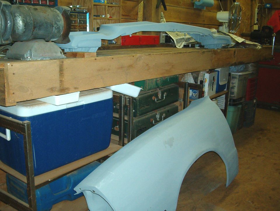 A couple shots inside the shop with II parts everywhere. A common sight.