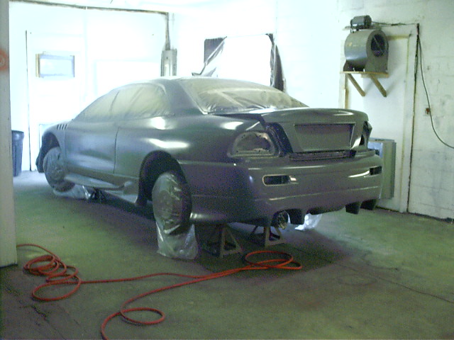 This is the car in the paint booth after it was covered with sealer.