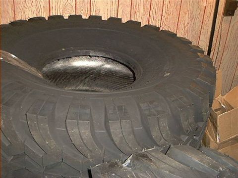 1979 Ford Bronco - A close-up view of a large, off-road tire, likely for a truck or SUV.