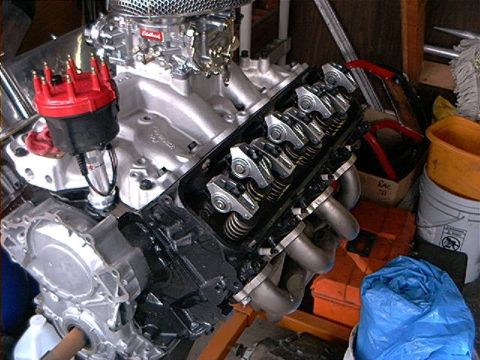 1979 Ford Bronco - Close-up view of an engine's internal components, including the valve train and distributor.