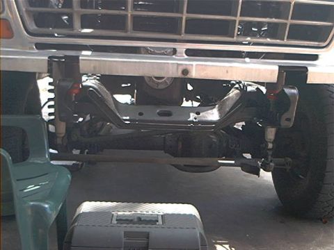 1979 Ford Bronco - Front view of a 1979 Ford Bronco, showing the grille and suspension components.