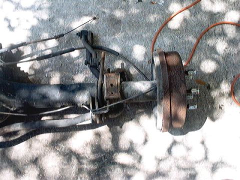 1979 Ford Bronco - Close-up of a vehicle's rear axle assembly, likely removed for repair or replacement.