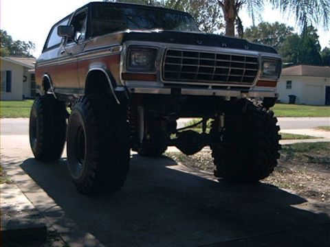 1979 Ford Bronco - This modified 1978 Ford Bronco features a significant lift and large off-road tires.