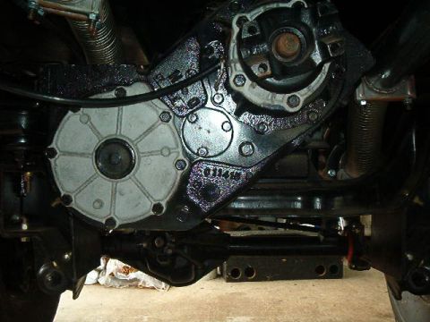 1979 Ford Bronco - Underside view of a vehicle's transfer case, showing mechanical components and a visible part number.