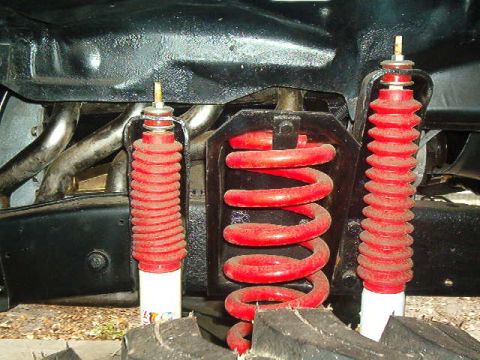 1979 Ford Bronco - Vehicle suspension components, including coil springs and shock absorbers, are visible.