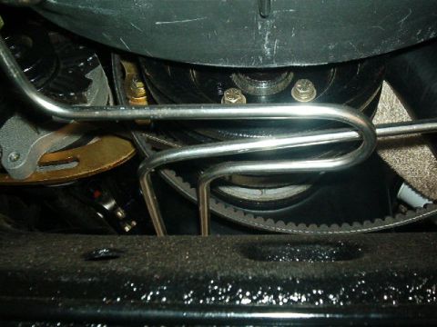 1979 Ford Bronco - Close-up view of an engine's belt and pulley system, showing mechanical components.