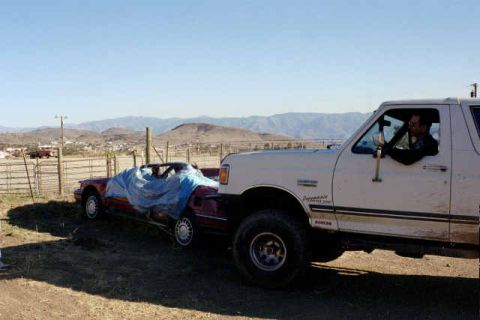 1990 Ford Bronco - goofing around next to a totaled car out at Emmetts. didn't crawl on it...may have damaged something...
