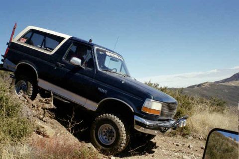 1990 Ford Bronco - Emmett following me down a little drop. My GF does'nt quite understand this...but will eventually understand my need to get out and wheel.