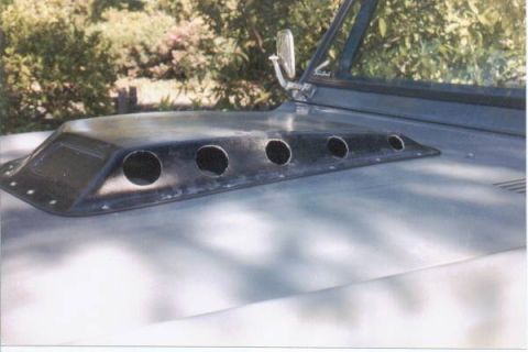 1966 Ford Bronco - A custom hood scoop with multiple circular vents is installed on a 1966 Ford Bronco.