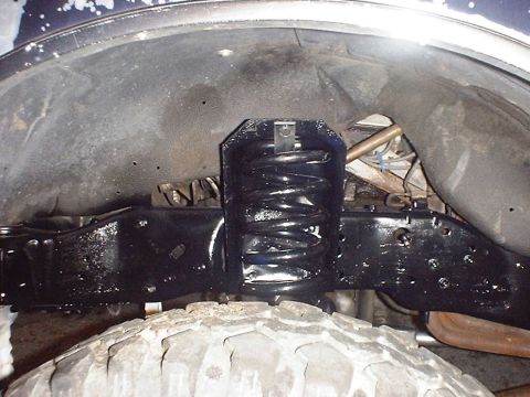 1988 Ford Bronco - Front axle and suspension components, likely from a truck or SUV.