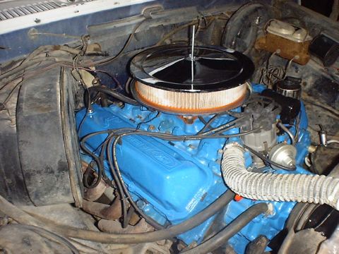 1988 Ford Bronco - Close-up of a blue Ford V8 engine, showing the air filter assembly and distributor.